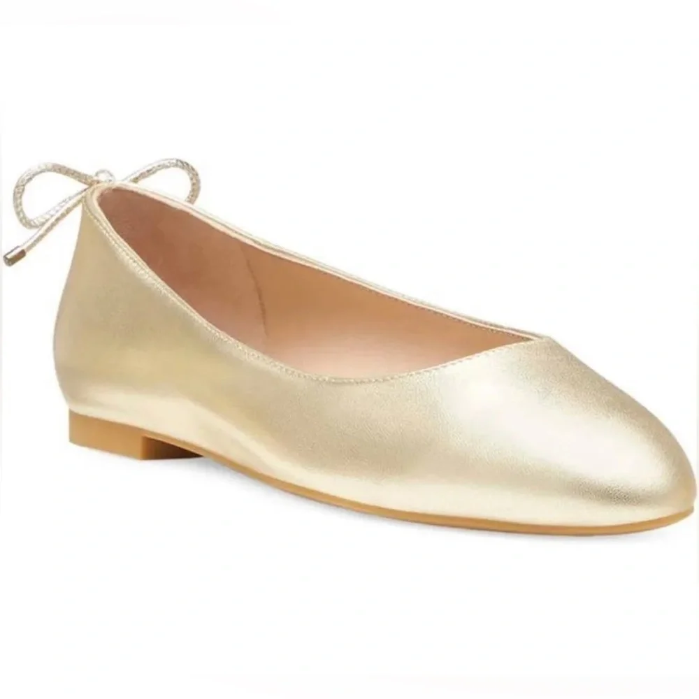 Stuart weitzman, tieback flat gold color, US 9